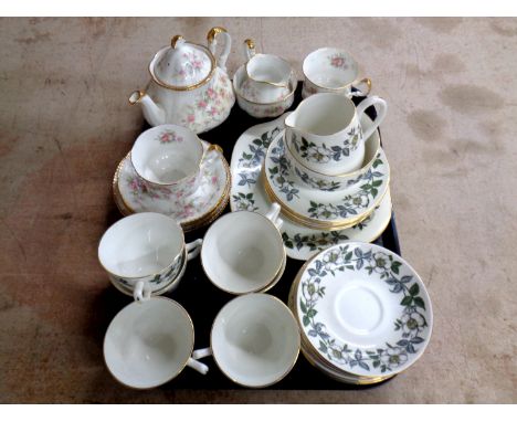 A tray containing a 9 piece Paragon Victoriana Rose tea for two together with a 21 piece Crown Staffordshire tea service  