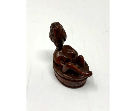 A carved hardwood Chinese netsuke - Erotic nude in wash tub