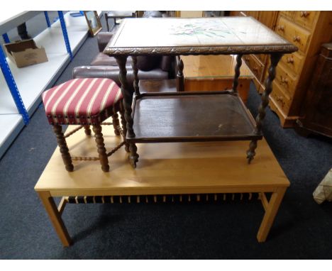 A Danish pine coffee table with web fabric under shelf, a trolley and a bobbin leg stool 