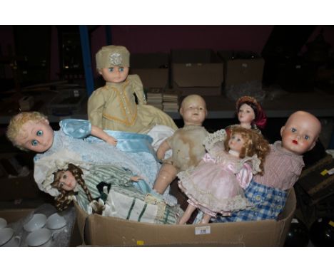 A vintage composite headed doll EIH Co, sold together with a box of modern dolls with stands. 