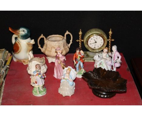 A green onyx mantle clock together with a selection of continental style figures. gilt decorated jugs etc