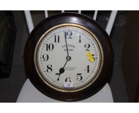 A National Electric station style clock, of circular form with Arabic hours, case diameter 36 cm
