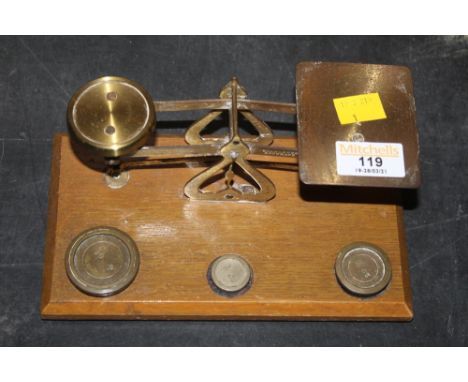 A set of brass and mahogany postal scales (20th century) 