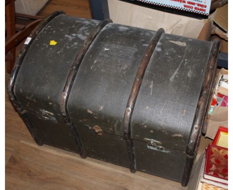 An Antique domed canvas travel trunk  