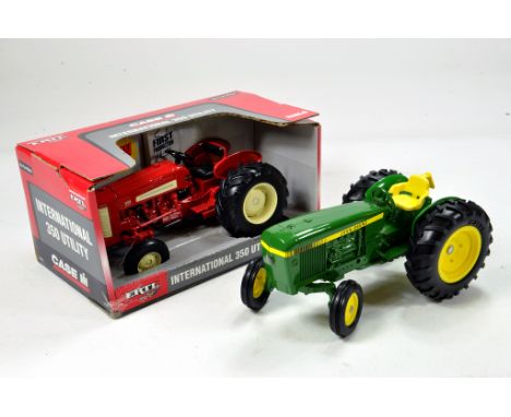 Duo of 1/16 Tractor issues comprising International 350 Utility plus John Deere issue. Generally E to NM.