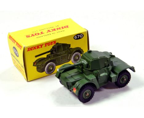Dinky No. 670 Armoured Car in military green. Nice example is NM in E Box.