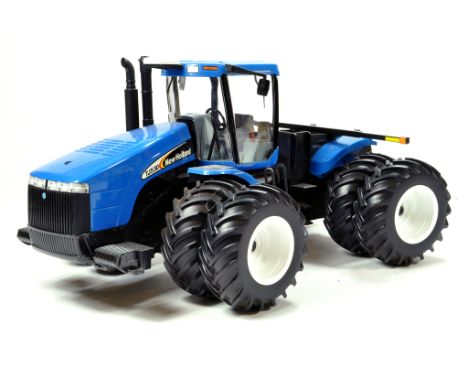 Ertl 1/16 New Holland TJ530 Tractor. E to NM. 