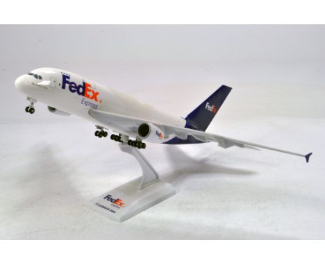 Fedex Model Aircraft on stand. Some attentioned needed hence G. 