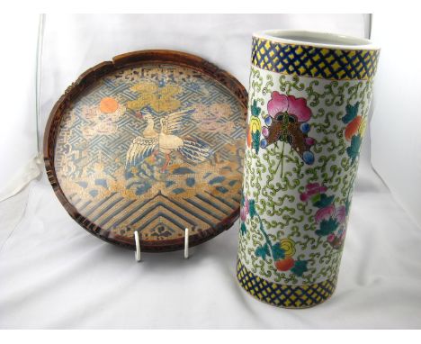 A tall cylindrical Chinese ceramic brush pot with butterflies and foliage in overglaze enamels, ht 28cm, and a Chinese circul