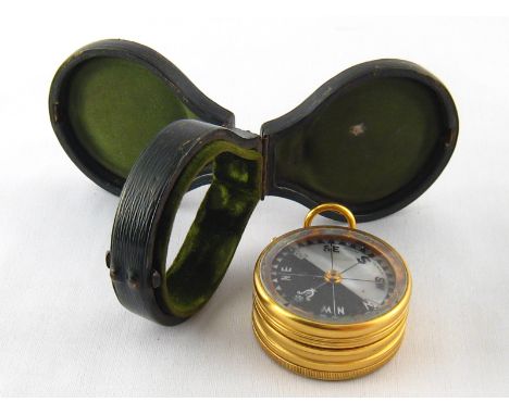 A pocket combined compass and altimeter/barometer by Negretti and Zambra in double lidded leather case. 