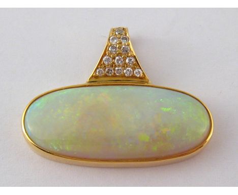 A yellow metal (tests 18 carat gold) opal and diamond pendant, opal approx 25 x 12.5mm, estimated diamond content approx 0.15