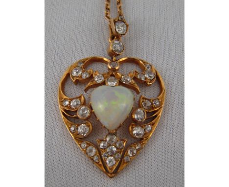 An antique 15 carat gold heart shape opal and old brilliant cut diamond pendant, opal approx 9.5 x 10mm, estimated total diam