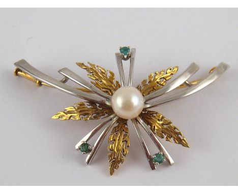 A yellow and white metal (tests 14 carat gold) brooch, set with emeralds and a cultured pearl, pearl approx 7mm diameter, bro