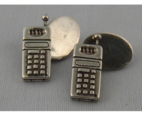 A pair of hallmarked sterling silver cufflinks designed as mobile telephones, approx 2.5cm,  20.5 gms.