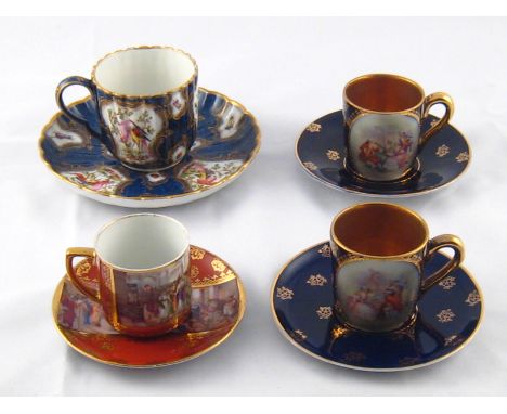 A ceramic teacup and saucer with hand painted panels of birds and insects, late 18th. century, with three other teacups and s
