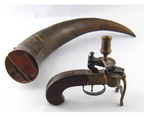 A table pistol flintlock tinder igniter with candlestick, having mahogany stock, brass fittings and steel mechanism complete 