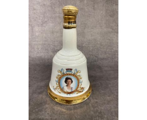 Collection of Bells whiskey in collectors decanters