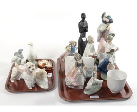 A collection of Lladro including Geisha girl, girl with parasol and other figures etc; together with Nao and Royal Doulton (q