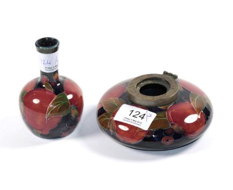 A small Moorcroft pottery bottle vase; and an inkwell, both pomegranate pattern (2)