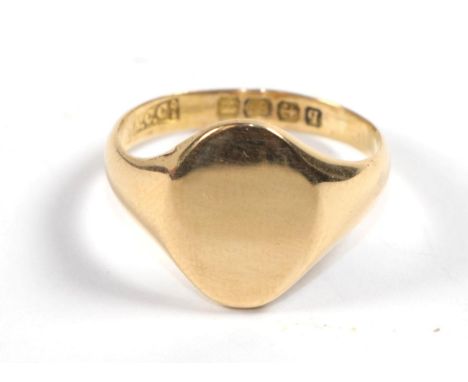 An 18 carat gold signet ring, finger size K.  Gross weight - 3.48 grams. 