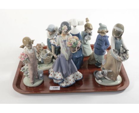 A collection of Lladro figures comprising: 5715, 5217, 5501, 5376, 5490, girl with cats and kittens; and a Nao group