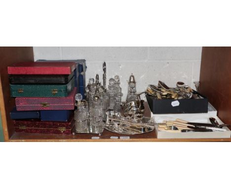 A shelf of silver plated, mostly flatware (some cased), cruet sets, etc