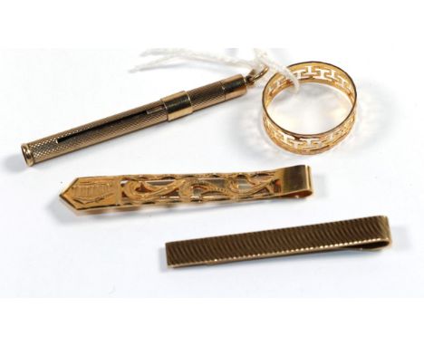 A 9 carat gold toothpick; a 9 carat gold tie clip; another tie clip stamped 'K14'; and a geometric patterned band ring stampe