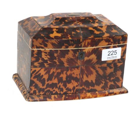 A Regency tortoiseshell and ivory sarcophagus form tea caddy
