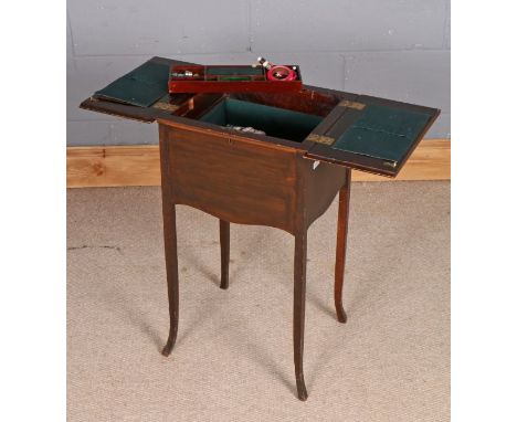 Late Victorian mahogany sewing table, the hinged flaps enclosing an interior with lift out tray and pin cushion, with content