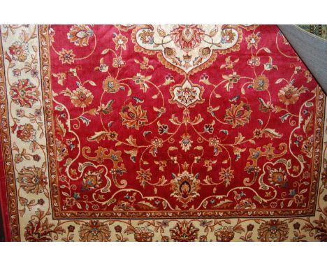 A modern Persian red ground Kashan carpet, 230 x 160cm