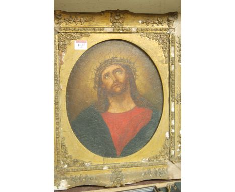 19th century school - Head and shoulders portrait of Jesus Christ, oil on canvas, framed as an oval, 31 x 26cm