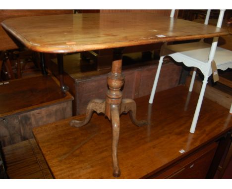 A circa 1830 mahogany round cornered tilt top pedestal tripod table, width 91cm
