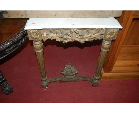 A 19th century gilt wood and white marble topped console table, raised on leaf capped fluted supports (marble repaired), widt