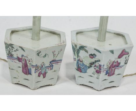 A pair of 18th/19th Century Chinese hexagonal porcelain jardinieres, decorated in enamels with figures in a garden, later con