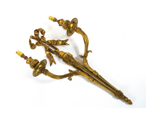 An early 20th century gilt brass  two branch wall light with ribbon detail 54.5cm high