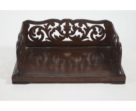 A Victorian rosewood book caddy with pierced back and sides, 39cm x 26.5cm