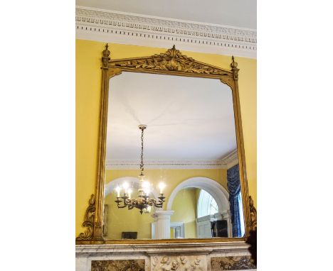 A 19th century gilt framed over-mantel mirror with scrolls to the architectural pediment, 181cm high x 158cm wide