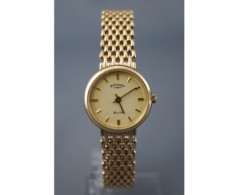 A hallmarked 9ct yellow gold rotary elite wristwatch. Quartz movement. 9ct yellow gold bracelet. Supplied with original rotar