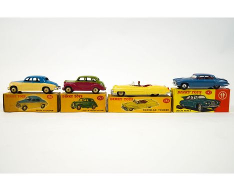 A group of four boxed Dinky toys, to include a 156 Rover saloon, 152 Austin Devon saloon, 131 Cadillac Tourer and 142 Jaguar 