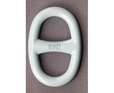 A light blue laquer chain D anchor scarf ring, by Hermes. Signed Hermes and supplied in original fitted case. 48.7 grams