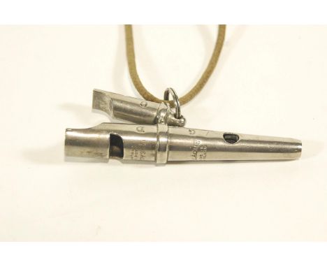 A sheep dogs whistle, playing GDC, stamped ACME Made in England, 10cm long