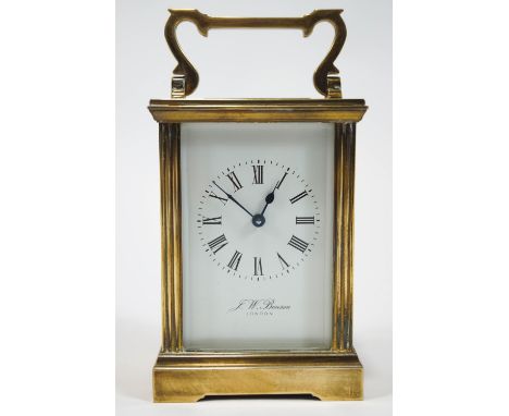 A brass cased five glass carriage clock, with white Roman dial marked J W Benson, London, with ribbed columns and strap handl