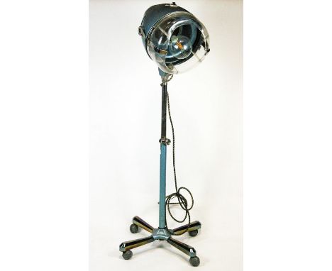 A Retro 1960's floor standing hairdryer, on wheeled stand, converted to an electric lamp, 149cm high