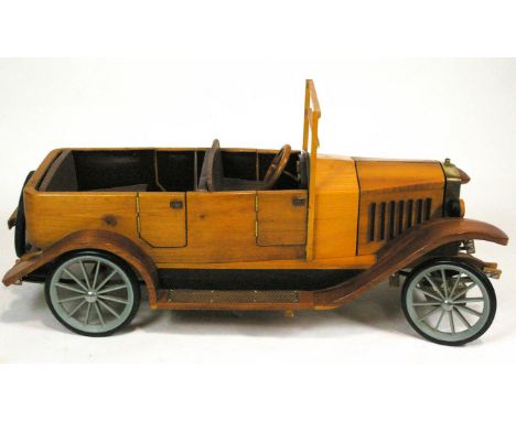 A wooden scale model of a Volvo OV4 car, 37cm high x 79cm wide x 35cm deep