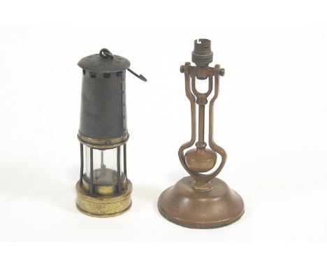 A 19th century miners lamp, numbered 604, 24cm high, together with  and a ships desk light, 28cm high