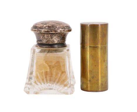 A silver-topped cut glass scent bottle, Birmingham, 1925, 6 cm, together with a brass trench art style lighter, 6 cm 