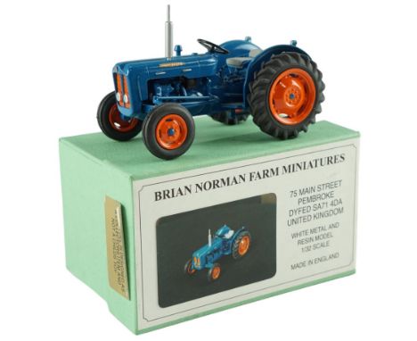 A boxed Brian Norman Farm Miniatures Fordson Dexta (FM 06) diecast model tractor, with signed and dated certificate of authen