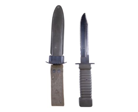 A post-War German-made military saw-back utility knife, in associated US M8A1 scabbard