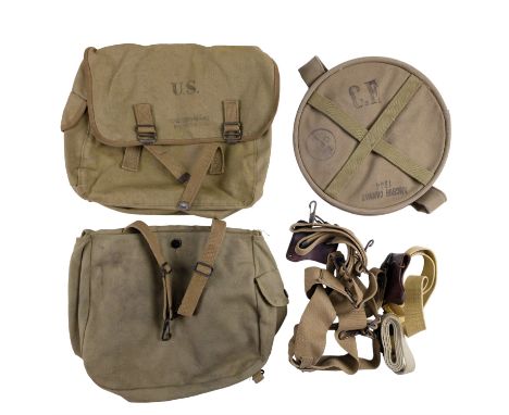A Second World War US army M 1936 musette bag, webbing suspenders, a canvas wash basin, a holster belt suspender, a reproduct