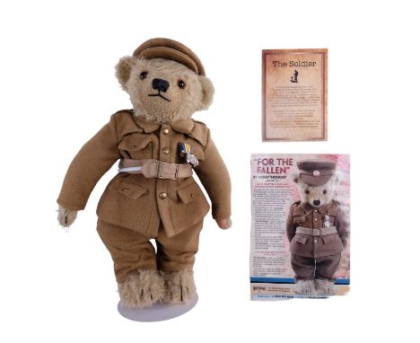 A Merrythought limited edition "The Fallen" Teddy bear, number 86 or 1918, with certificate and stand, 35 cm